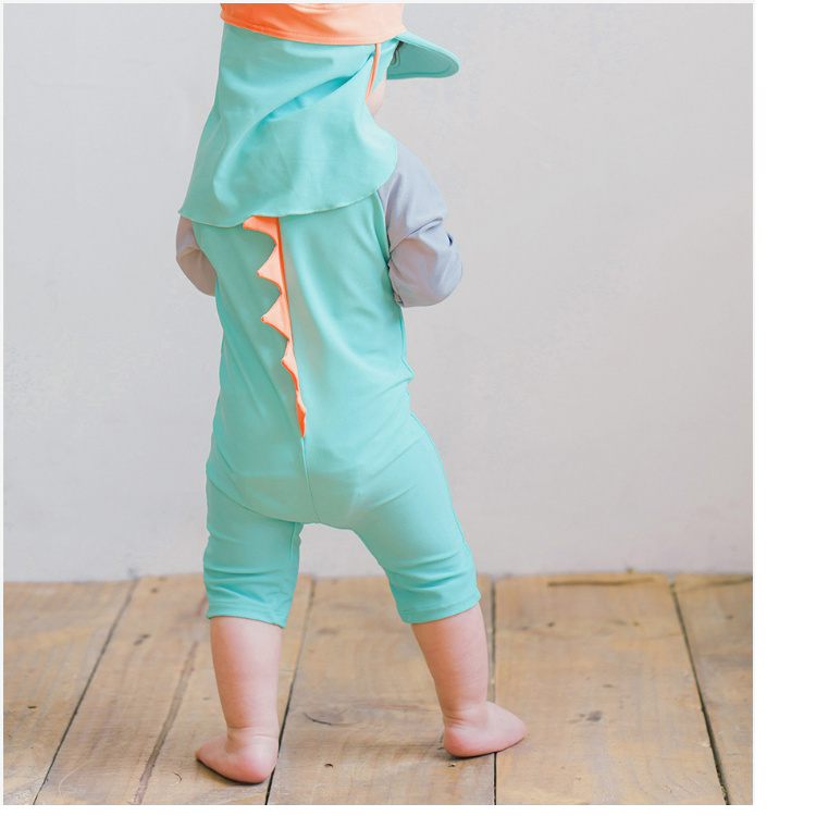 GBlinker Das Baby ist niedlich und bequem in einer Dinosaurier Bademode